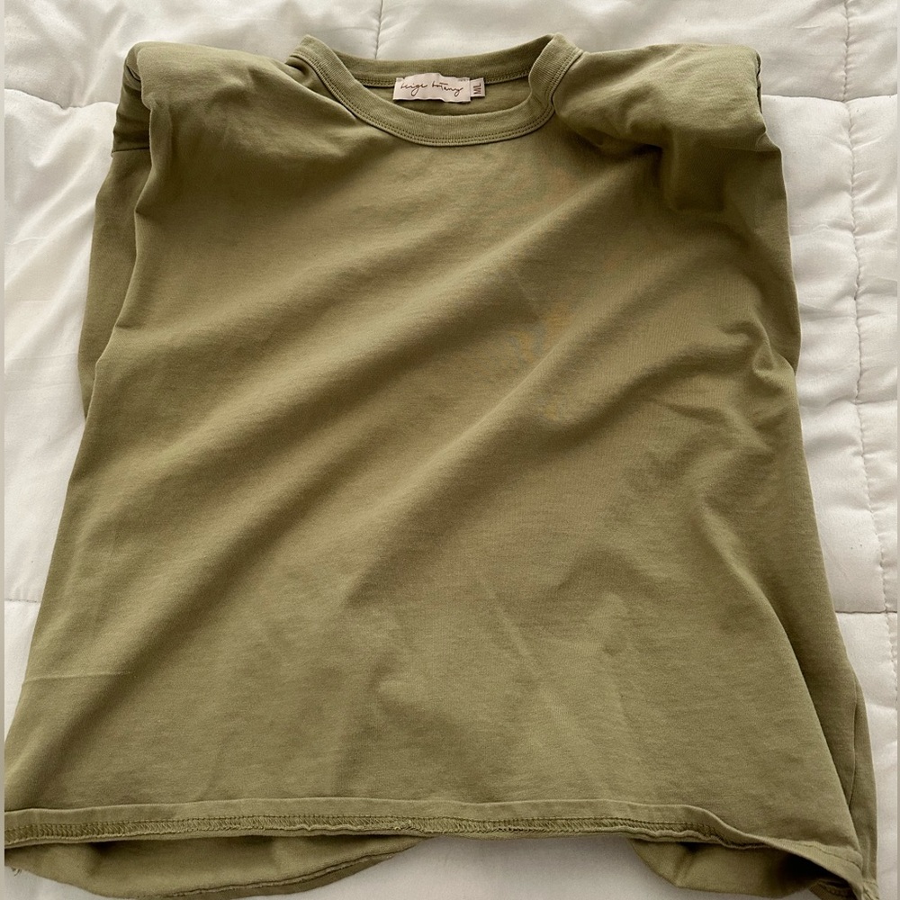 Women’s light green muscle tee w/ shoulder pads